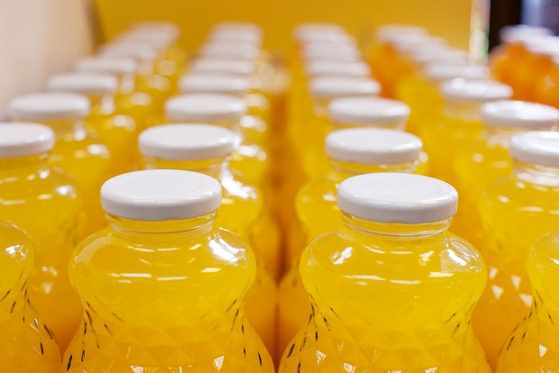 rows and rows of glass bottled delicious fresh squeezed orange juice at antons fruit ranch