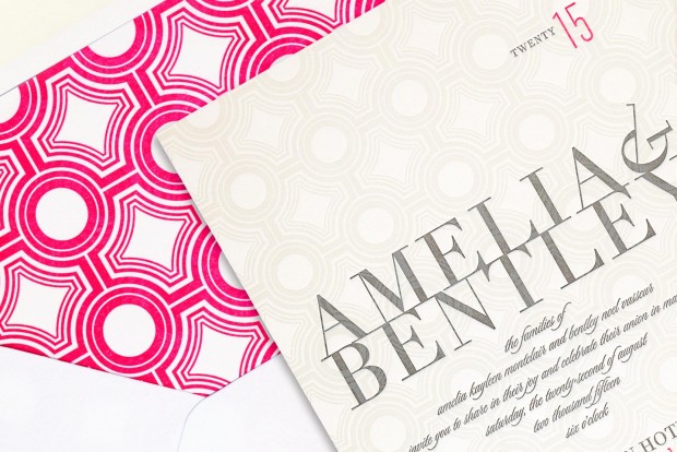 a beautiful sample wedding invitation for amelia and bentley, overlayed on top of its envelope featuring a beautiful hot pink liner, captured by 4d, inc